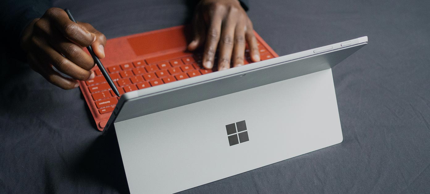 Someone working on tablet 25